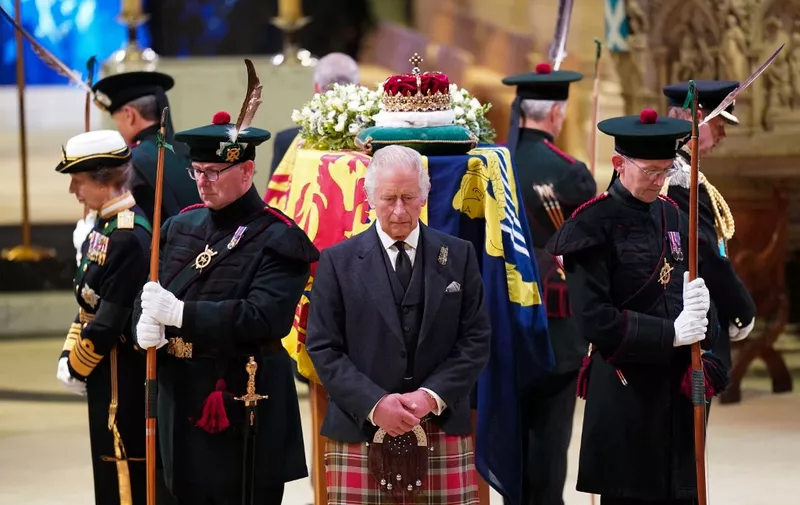 Britain's King Charles III attends a Vigil at St Giles' Cathedral, in Edinburgh, on September 12, 2022, following the death of Queen Elizabeth II on September 8. - Mourners will on September 12, 2022 get the first opportunity to pay respects before the coffin of Queen Elizabeth II, as it lies in an Edinburgh cathedral where King Charles III will preside over a vigil. (Photo by Jane Barlow / POOL / AFP)