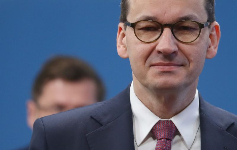 Poland's Prime Minister Mateusz Morawiecki arrives for the second day of a special European Council summit in Brussels on February 21, 2020, held to discuss the next long-term budget of the European Union (EU). (Photo by Ludovic Marin / POOL / AFP)