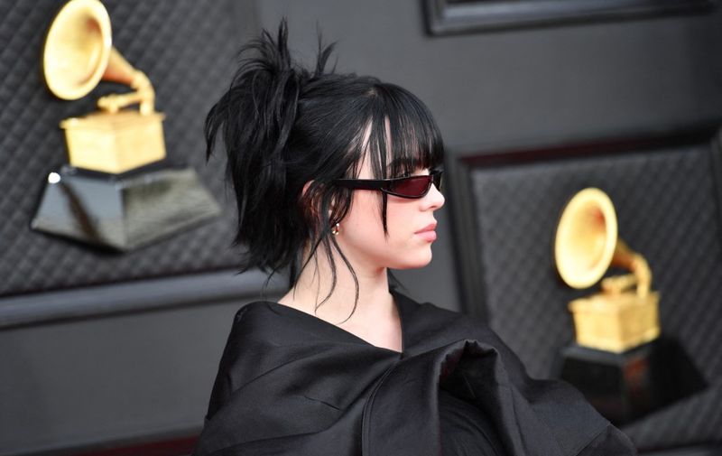 US singer/songwriter Billie Eilish arrives for the 64th Annual Grammy Awards at the MGM Grand Garden Arena in Las Vegas on April 3, 2022. (Photo by ANGELA WEISS / AFP)