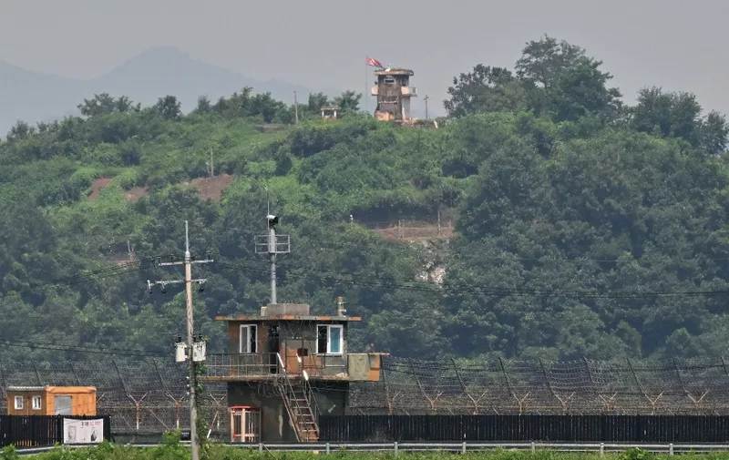 A North Korean guard post (top) and a South Korean guard post (bottom) face each other as seen from the border city of Paju on July 27, 2023. (Photo by Jung Yeon-je / AFP)