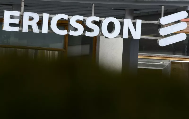 (FILES) In this file photo taken on November 7, 2012, shows Swedish provider of telecommunications equipment and data communication systems giant Ericsson logo at the Ericsson headquarters in Stockholm's suburb of Kista. - Swedish telecoms firm Ericsson has agreed to pay more than USD 1 billion to resolve allegations of bribery in countries around the world, the US Justice Department announced on December 6, 2019. (Photo by Jonathan NACKSTRAND / AFP)