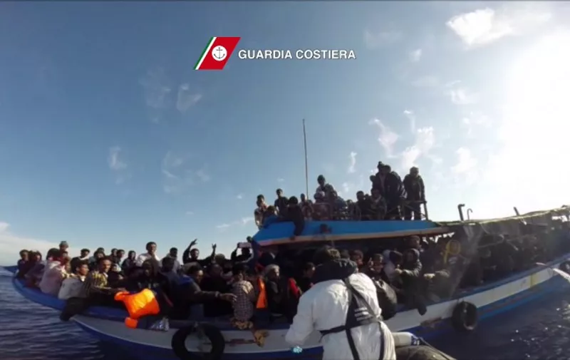 In this video grab released by the Italian Coast Guards (Guardia Costiera) on April 13, 2015 a boat of the Italian Guardia Costiera takes part in a rescue operation of migrants off the coast of Sicily on April 12, 2015. The Italian coastguard said Monday it recovered nine bodies after a boat carrying more than [&hellip;]