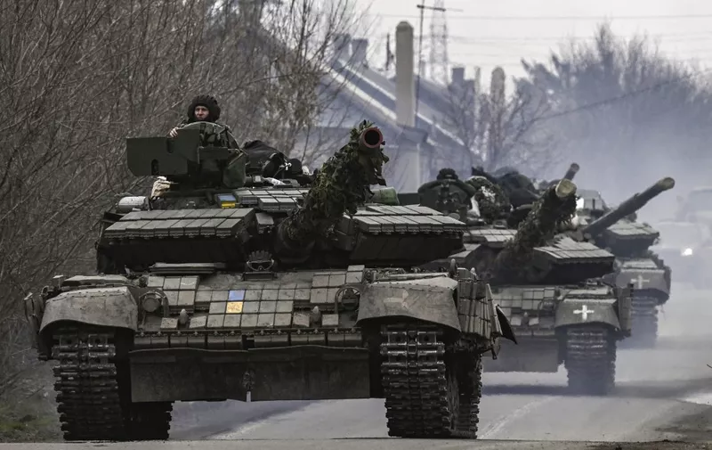 Ukrainian T64 tanks move towards Bakhmut direction, in Donetsk Oblast region, on March 20, 2023. - The head of Russia's Wagner mercenary group said on March 20, 2023 that his forces control more than half of the embattled eastern Ukraine town of Bakhmut, the stage for the longest battle of Russia's offensive. (Photo by Aris Messinis / AFP)